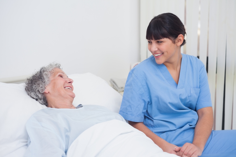 3598038-nurse-smiling-to-an-elderly-patient